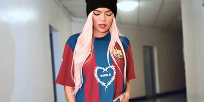 Karol G's barbed wire heart logo takes over FC Barcelona shirts