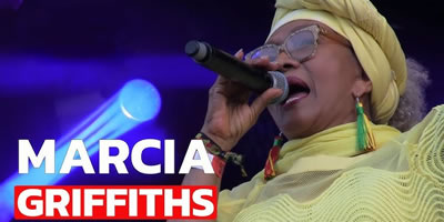 Explaining the meaning behind Electric Slide lyrics by Marcia Griffiths